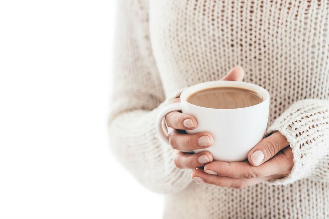 A glass with keto coffee to lose weight
